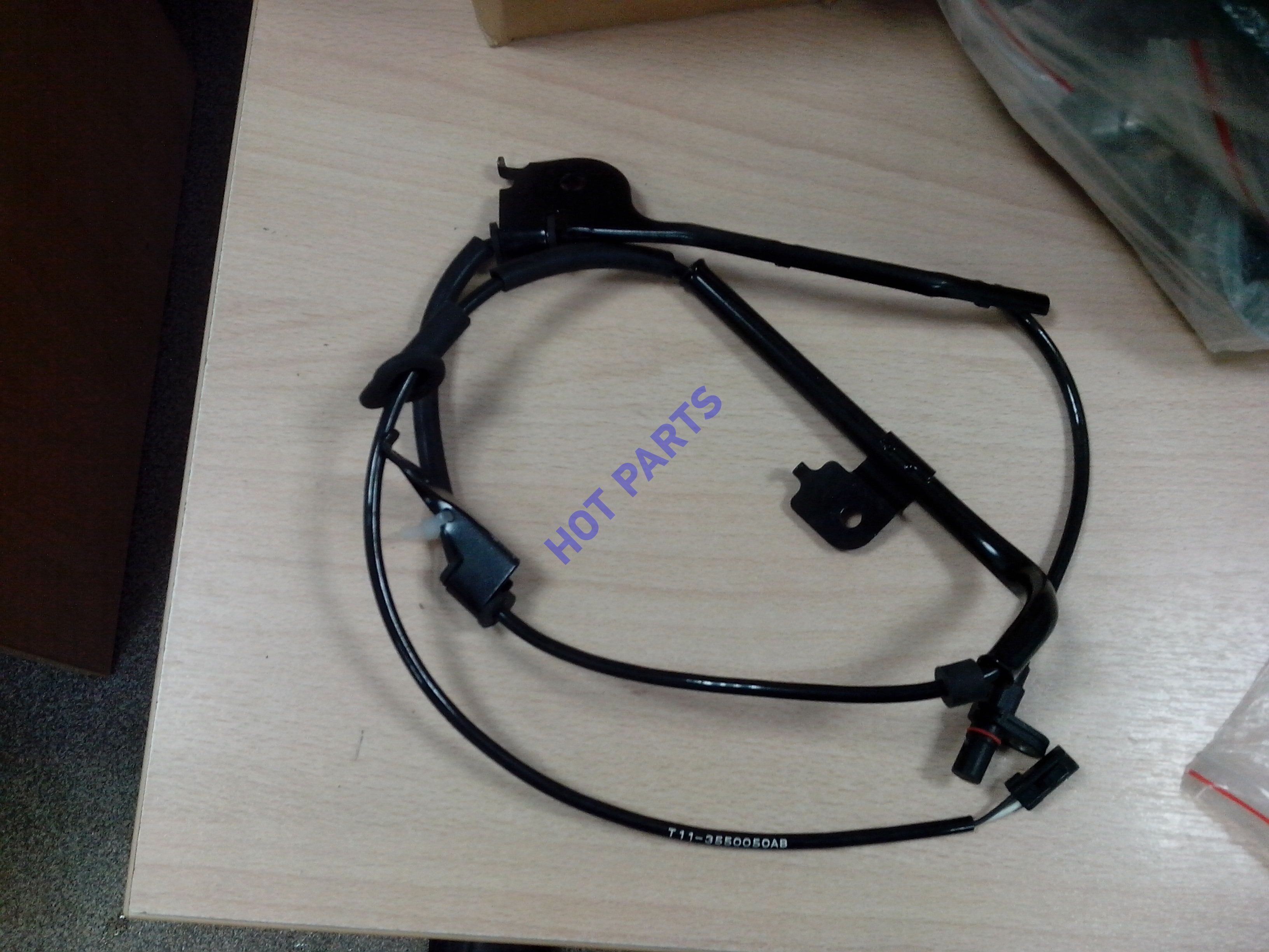 картинка ДАТЧИК ABS (АБС) ЗАДНИЙ ЛЕВЫЙ (ПЕРЕДНИЙ ПРИВОД)  T11-3550050BA